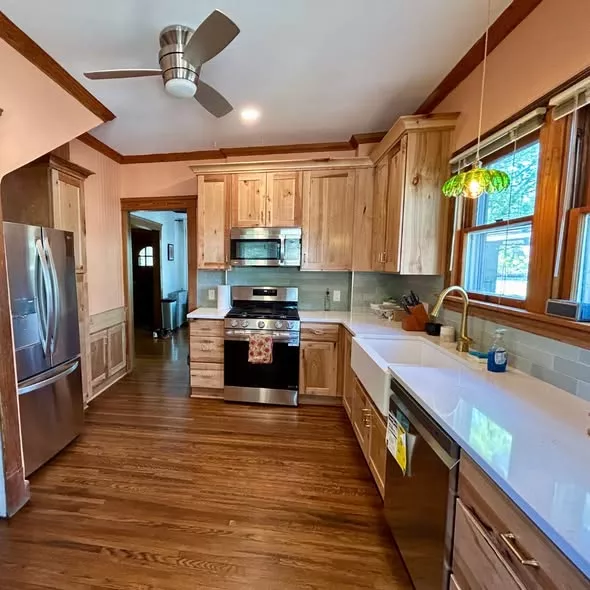 Natural Wood Kitchen Cabinets with White Quartz Countertops in Cleveland Ohio