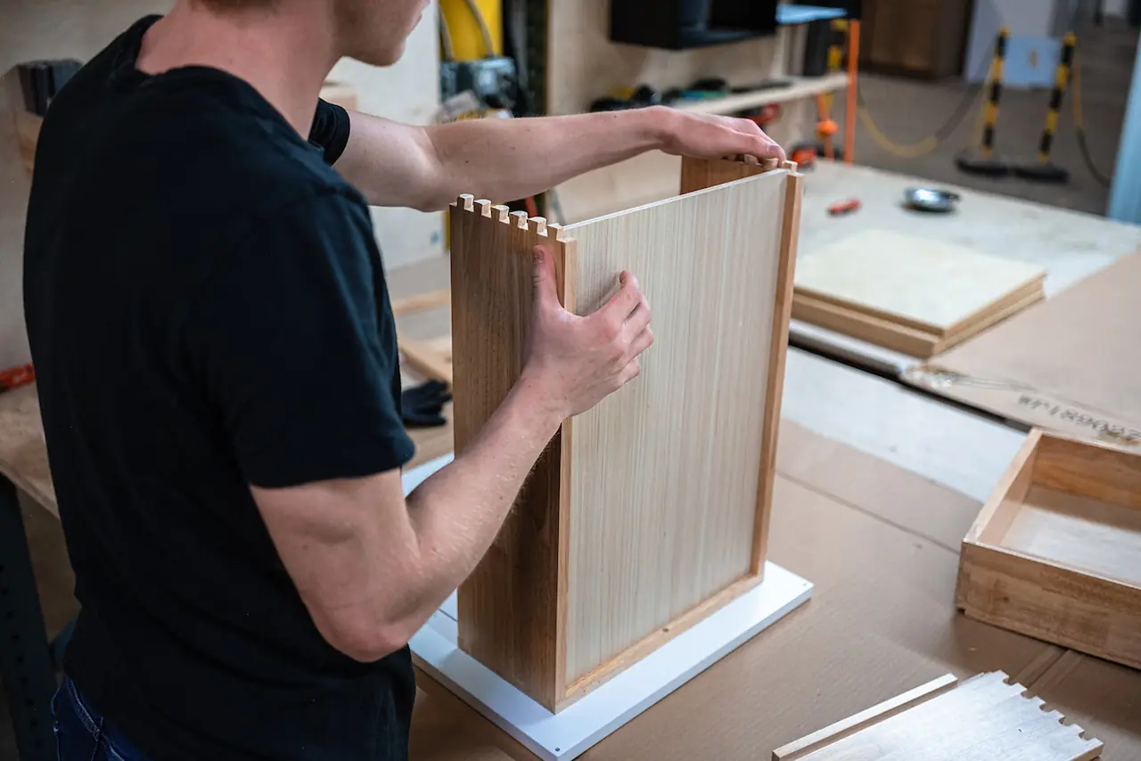 Worker assembling a cabinet box Maple Heights Ohio