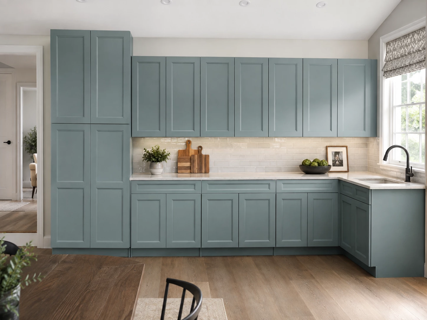 Green Bevel kitchen cabinets with a white tile backsplash in a Cleveland, Ohio kitchen