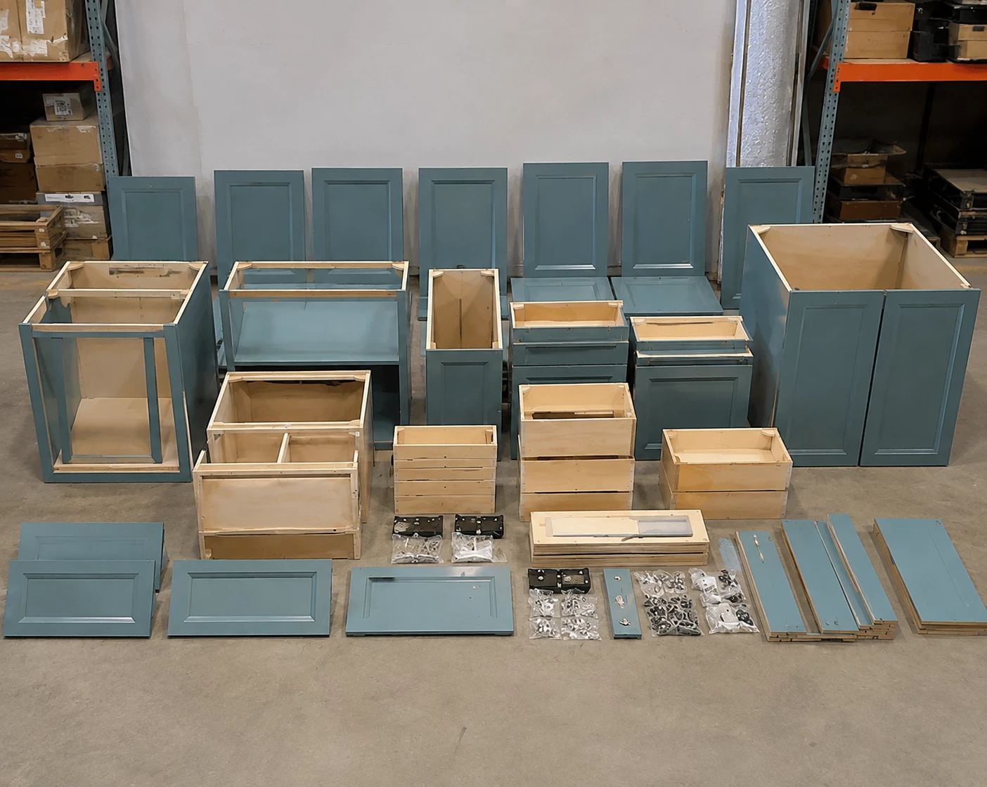 Unassembled green Bevel cabinet parts and hardware at the Cleveland warehouse