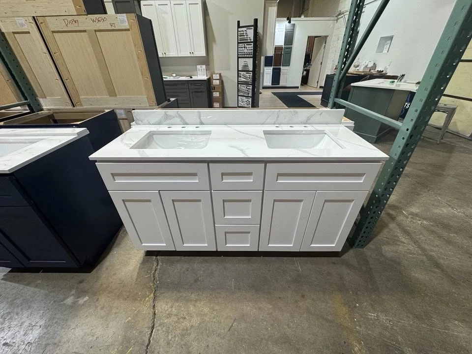 60 inch White Shaker vanity with quartz countertop and double bowl sink at the RTA Cabinets Ohio warehouse in Cleveland