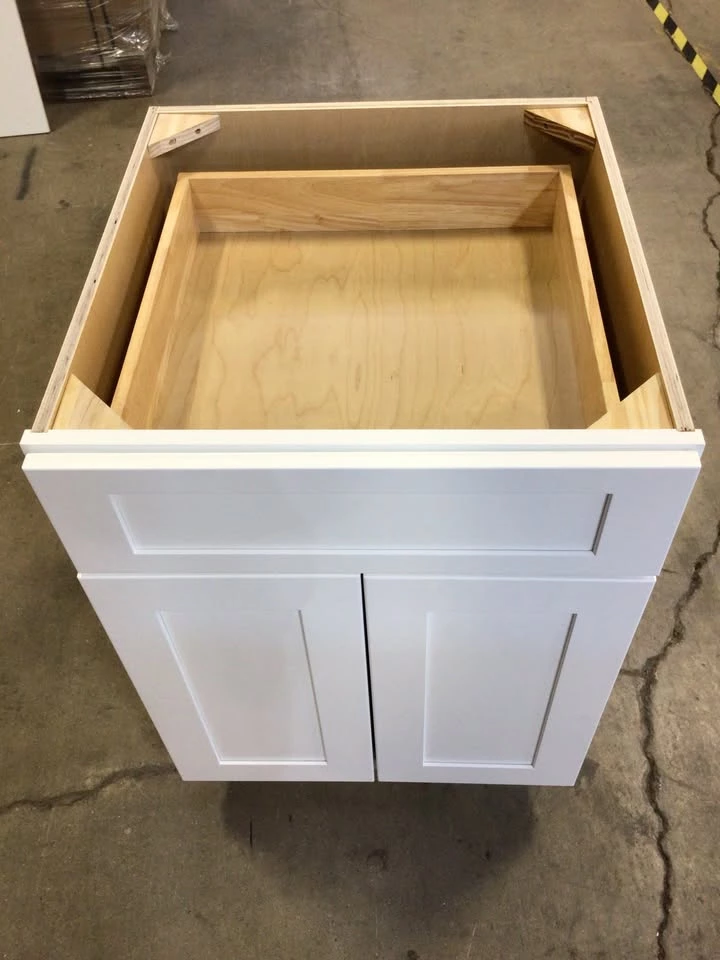 White Shaker base cabinet with drawer boxes on display in Cleveland, Ohio