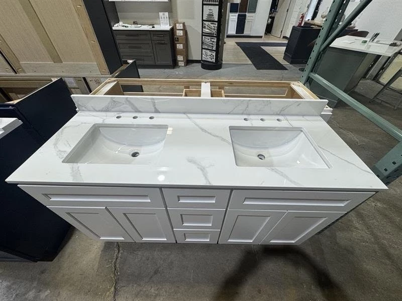 Top view of the quartz countertop and double bowl sink on the White Shaker vanity in Cleveland, Ohio