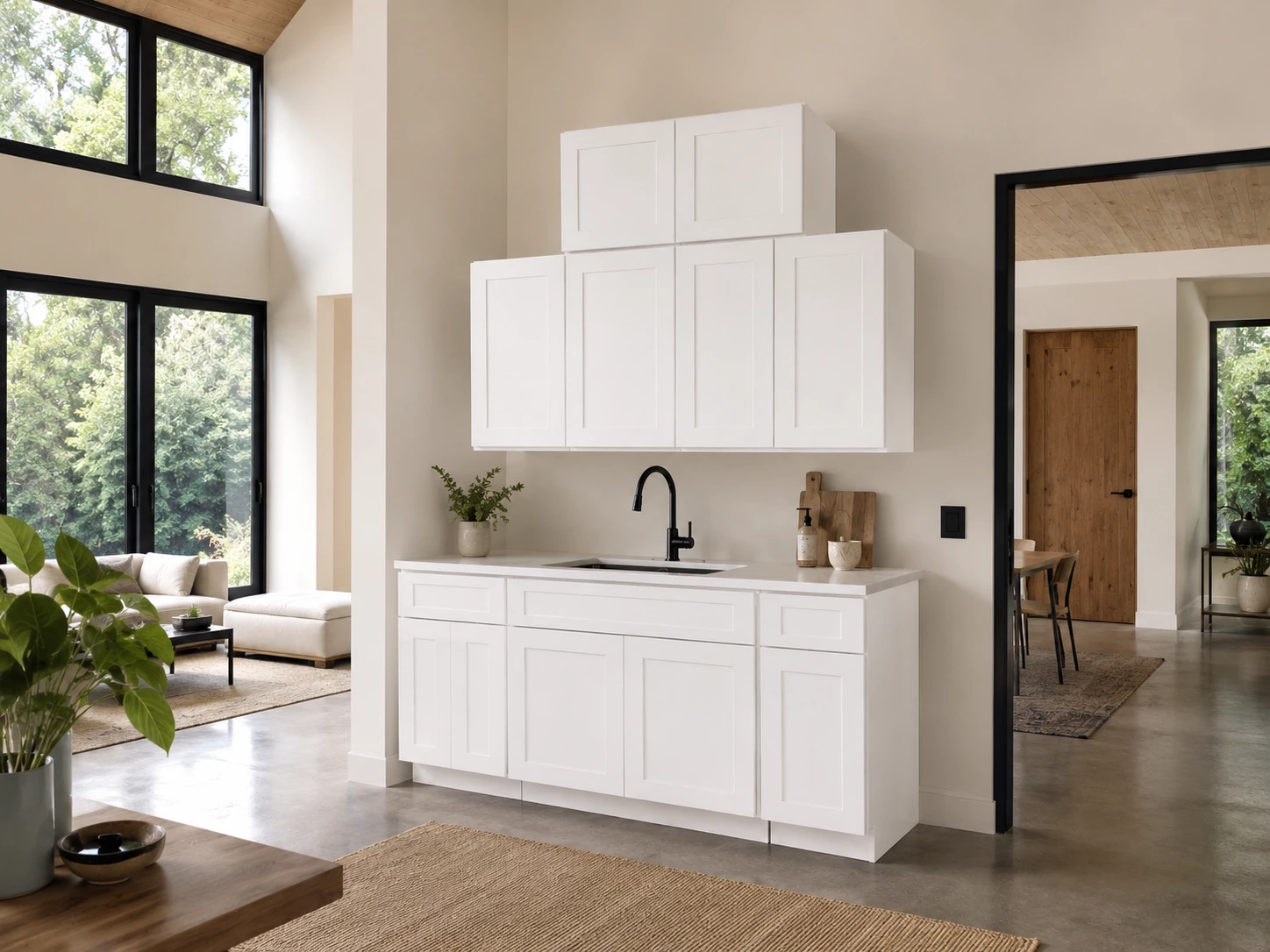 White Shaker kitchen cabinets in a contemporary open concept home in Cleveland, Ohio